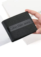 طقم حزام ومحفظة رجالي وجهين من Calvin Klein
